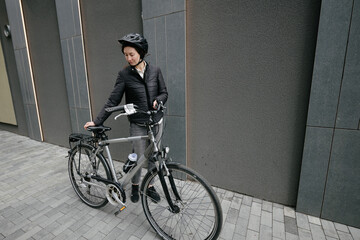Woman riding a bicycle in a city