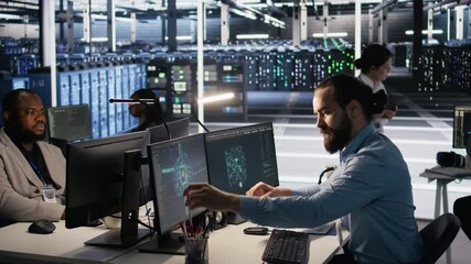 Engineer in data center reorganizing desk items at workstation to streamline workflow and boost productivity. Technician arranging desk objects to optimize efficiency during tasks, camera A