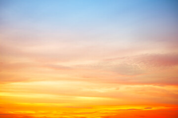 Beautiful , luxury soft gradient orange gold clouds and sunlight on the blue sky perfect for the background, take in evening,Twilight, Large size, high definition landscape photo