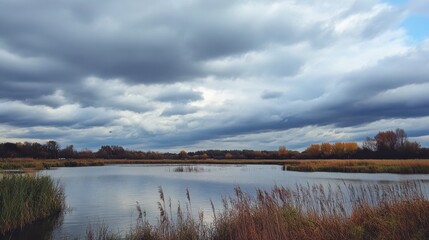 Obraz premium Cloudy Day - Gloomy Autumn Sky Filled with Heavy Clouds on a Stormy Day