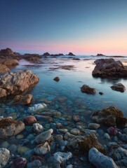 Rocky Coastline at Dusk With Calm Water, Showcasing Tranquility and Natural Beauty for Travel and Tourism Marketing Campaigns : Generative AI