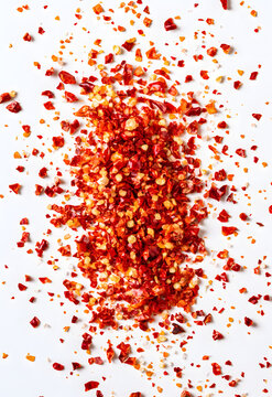 Splashes of red peppers create a grunge texture with bright spray paint-like colors.