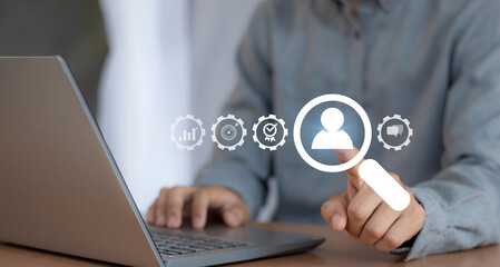 Business marketing position concept, businessman holds dart board icon with arrows for customer target group.	
