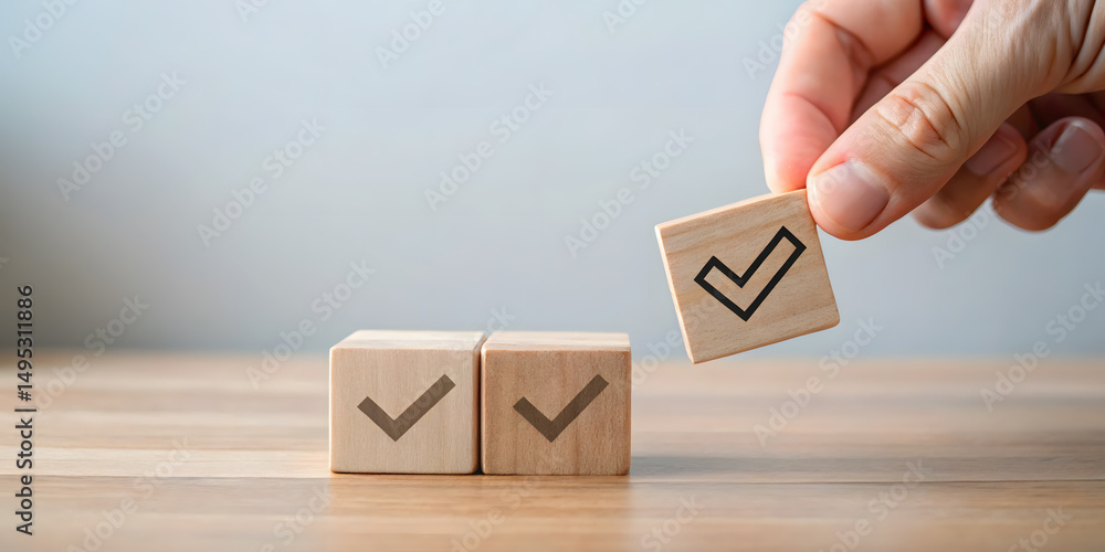 Poster hand placing wooden block with check mark completing a row of task completion checklist