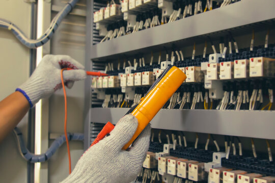 Technicians use multimeter to test or diagnose electrical control devices.