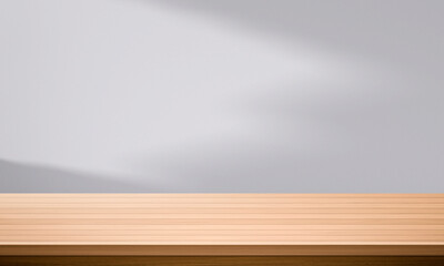 Wood table top and blurred wall shadow leaves window background can used for display or montage your products
