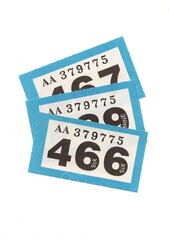 A fan of raffle tickets isolated on a white background.