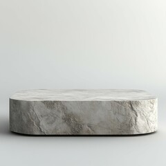 A textured, oval-shaped stone platform on a minimalist background.