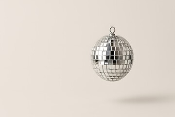 Obraz premium Disco Ball Floating in Blue Light