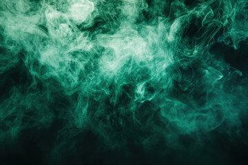 Obraz premium Green smoke swirling against black background, creating a mystical and atmospheric effect.