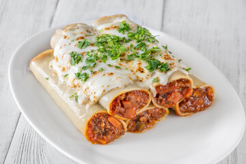 Oven-Baked Cannelloni Stuffed with Savory Bolognese and Covered in Golden Mozzarella