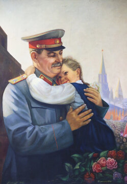  Gori Georgia - Portrait of Joseph Vissarionovich Dzhugashvili aka Stalin hangs in town of his birthplace. Exhibit in Stalin Museum in Gori city