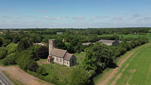 4k aerial footage of the All Saints Church in Thorpe Abbotts, Norfolk, UK