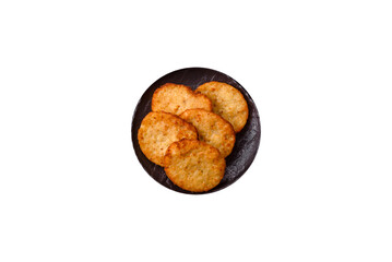 Potato hash browns, a meal with onions, cabbage in the form of fritters