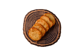 Potato hash browns, a meal with onions, cabbage in the form of fritters