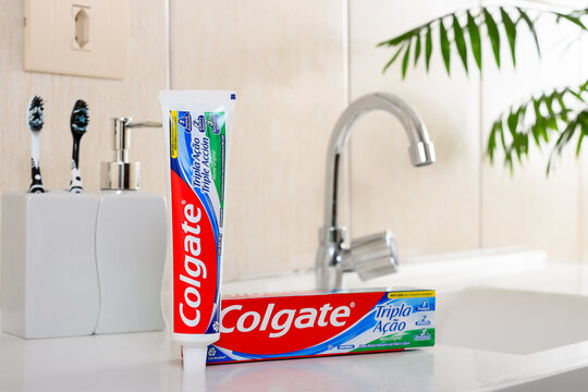 Sao Paulo, Brazil, May 17, 2025, Colgate toothpaste and toothbrush set in a bathroom, Colgate Triple Action.