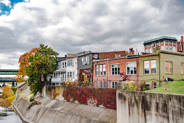 architecture of the old American town of Cumberland. Colored brick houses and streets under the autumn sky.