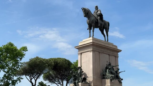 The statue of Garibaldi on Janiculum Hill, Rome, honors Italy&rsquo;s national hero with panoramic city views, symbolizing unity and patriotism in a historic, scenic setting.

