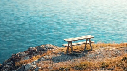 Wooden Picnic Bench Overlooking the Ocean on a Cliffside Trail