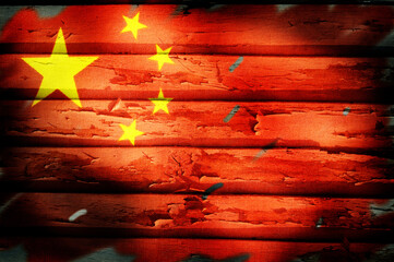 People republic of China flag grunge style on wooden background.