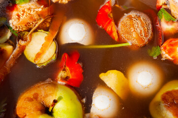 Food waste pollution. Rotten spoiled food leftover. Organic waste background. Leftover meals....