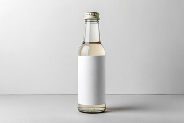Fototapeta premium Clean Bottle with Label: A minimalist photo presents a sleek, transparent bottle, its blank label offering an open canvas for customization.