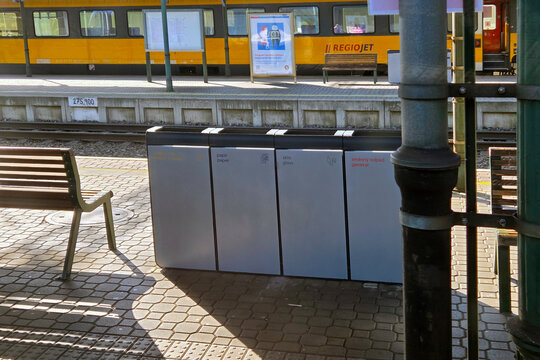 Bohumin, Czech Republic, May 3, 2025: Train Station Recycling Bins and Platform Scene for Urban Sustainability Concepts