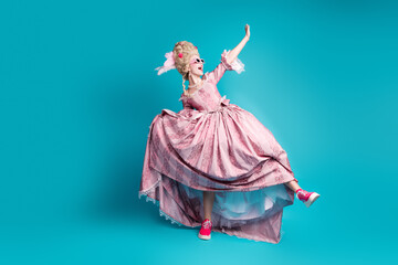 Naklejka premium Full size photo of young aristocratic woman dance chill wear baroque dress isolated on teal color background