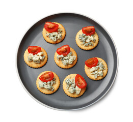 Tasty crackers with blue cheese and tomatoes isolated on white, top view