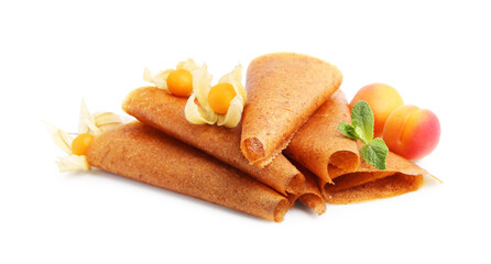 Delicious fruit leather rolls, apricots and physalis isolated on white