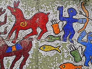 Colorful mosaic depicting hunting scenes with animals and hunters