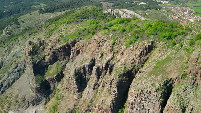 Drone view of the ancient Monyak fortress located on a hill near Kardzhali, Bulgaria. Panoramic view of the ancient Monyak fortress located on a hill on the shore of the dam Studen Kladenets near Kard