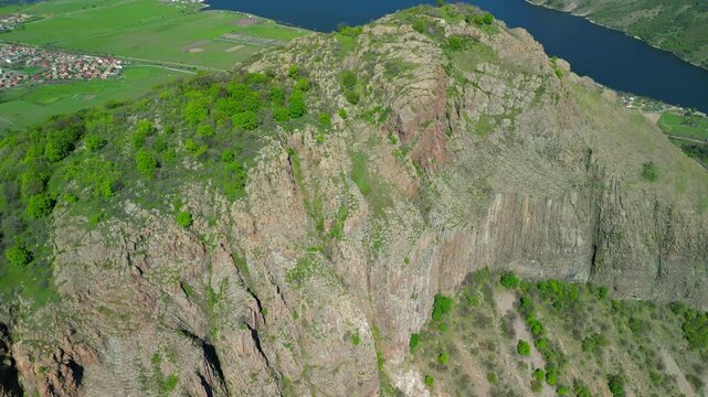 Drone view of the ancient Monyak fortress located on a hill near Kardzhali, Bulgaria. Panoramic view of the ancient Monyak fortress located on a hill on the shore of the dam Studen Kladenets near Kard