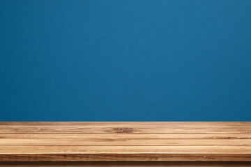 Empty wooden table top and color blue wall background for showing products and advertisers. Template mock up for display of product. product promotion in the wall. for display or montage.