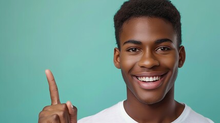 Black American male pointing with index finger at blank space on green background with toothy smile, Generative AI.