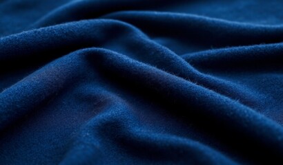 Ink blue cashmere fabric closeup with soft texture