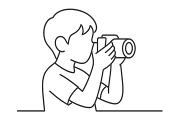 Young boy taking pictures with camera during a sunny day outdoors in a park setting
