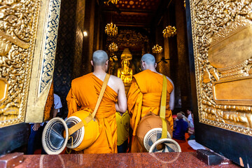 Background of the sculpture of the ancient Buddha image at Wat Bowonniwetwiharn Ratchaworawiharn,where the ordination ceremony is performed according to faith ,there are always foreign tourists visit.