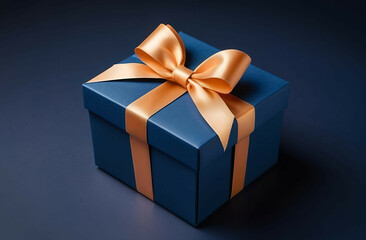 Obraz premium Beautiful gift box on a dark blue background with a bow