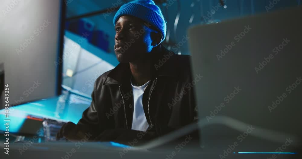 Poster Computer, night and black man in office for coding, programming, software update and cybersecurity. Professional, working late and person on pc for website development, user interface and AI system