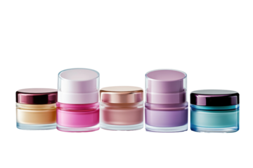 A group of five cosmetic containers with different colored creams and lids arranged in a horizontal line
