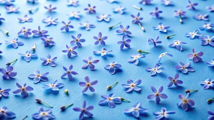 Scattered Delicate Blue Blossoms on Smooth Azure Surface, a Floral Pattern of Springtime Charm and Natural Beauty