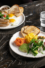 Table served with appetizing classic breakfast sets
