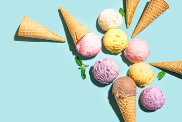 Ice cream scoops and waffle cones creative flat lay