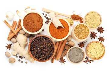 Different aromatic spices isolated on white, top view