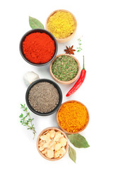 Different aromatic spices isolated on white, top view