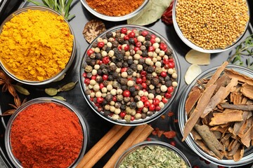 Different aromatic spices on tray, top view