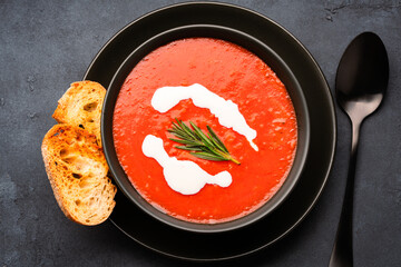 Homemade tomato soup on vintage table
