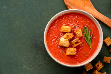 Homemade tomato soup on vintage table