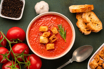 Homemade tomato soup on vintage table